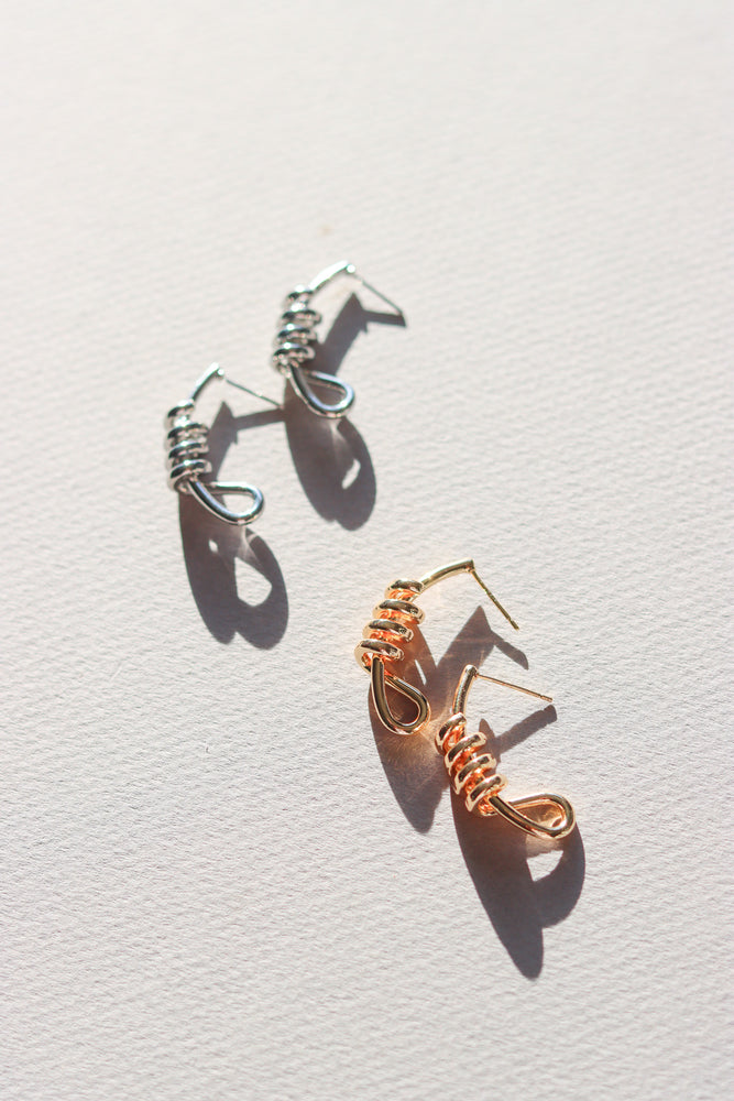 X-GOLD PLATED KNOT STUD EARRINGS