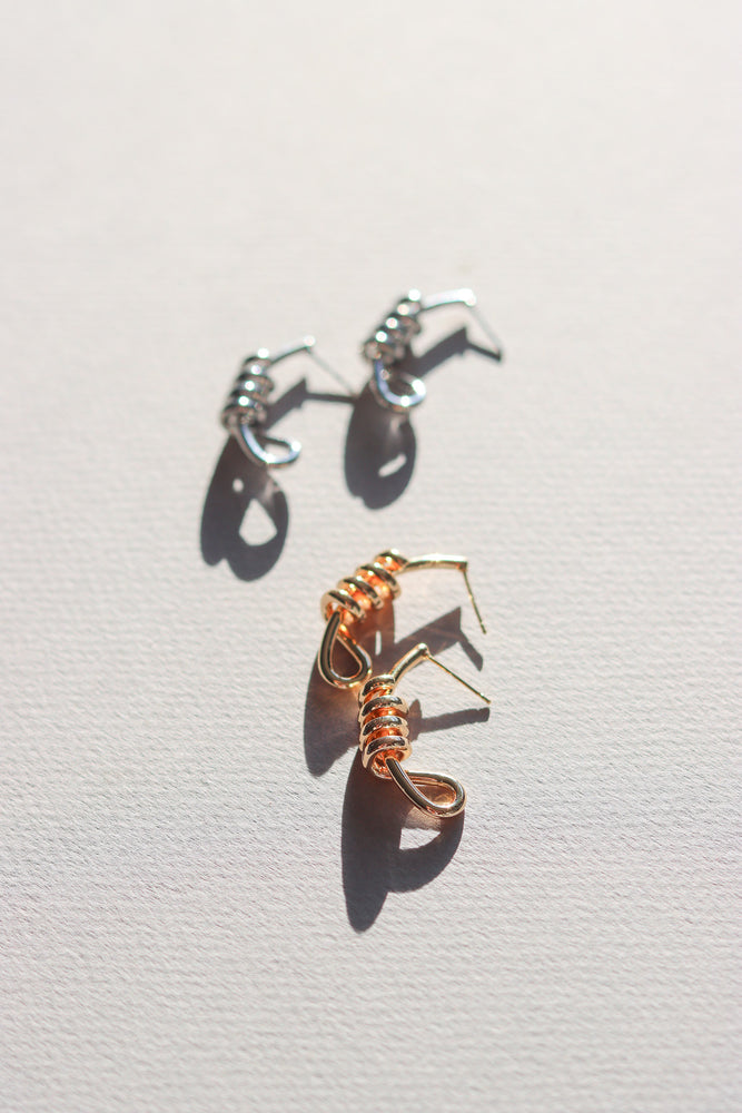 X-GOLD PLATED KNOT STUD EARRINGS