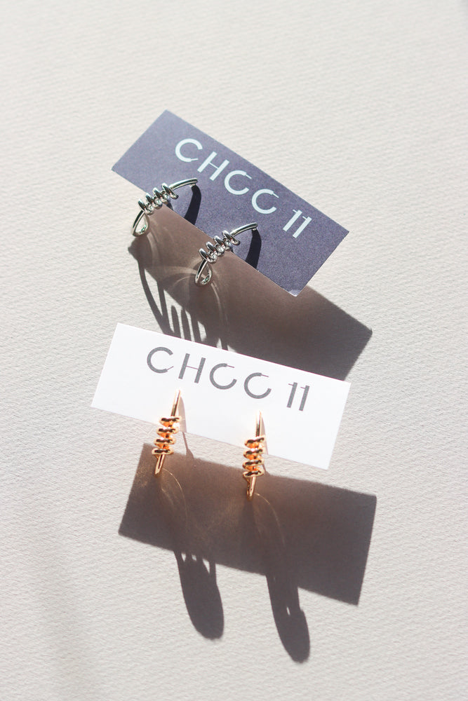 X-GOLD PLATED KNOT STUD EARRINGS