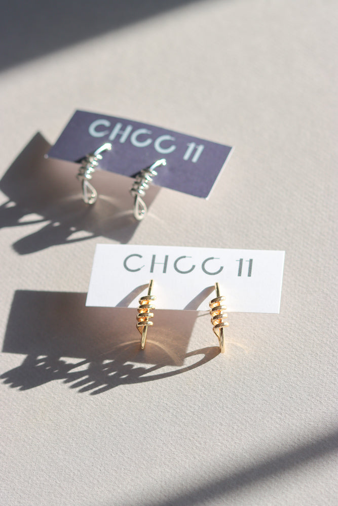 X-GOLD PLATED KNOT STUD EARRINGS