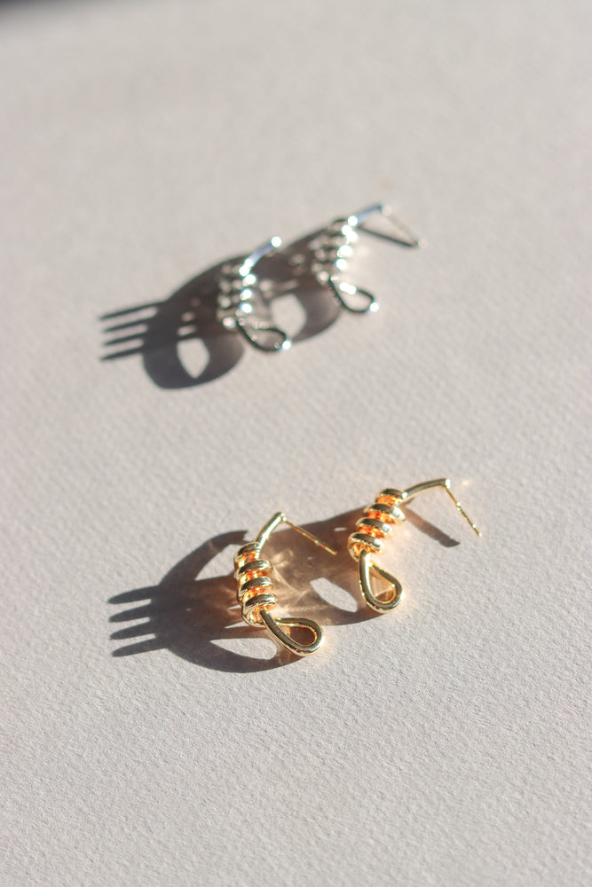 X-GOLD PLATED KNOT STUD EARRINGS