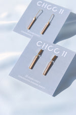 X-MOTHER OF PEARL EARRINGS